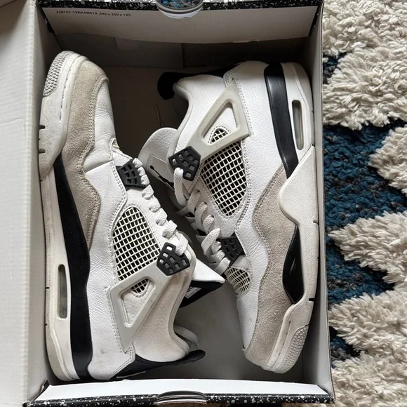 Air Jordan 4 Retro White and Black Sneakers